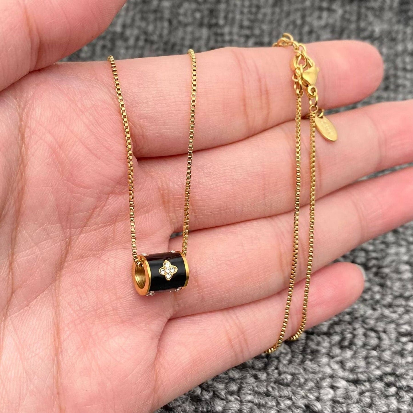 Inlaid CZ Black Roller Charm 18K Gold Plated SS Necklace - FGS