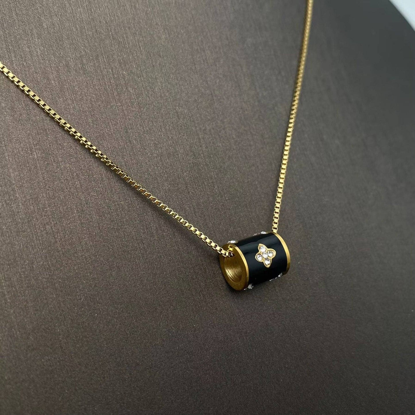 Inlaid CZ Black Roller Charm 18K Gold Plated SS Necklace - FGS