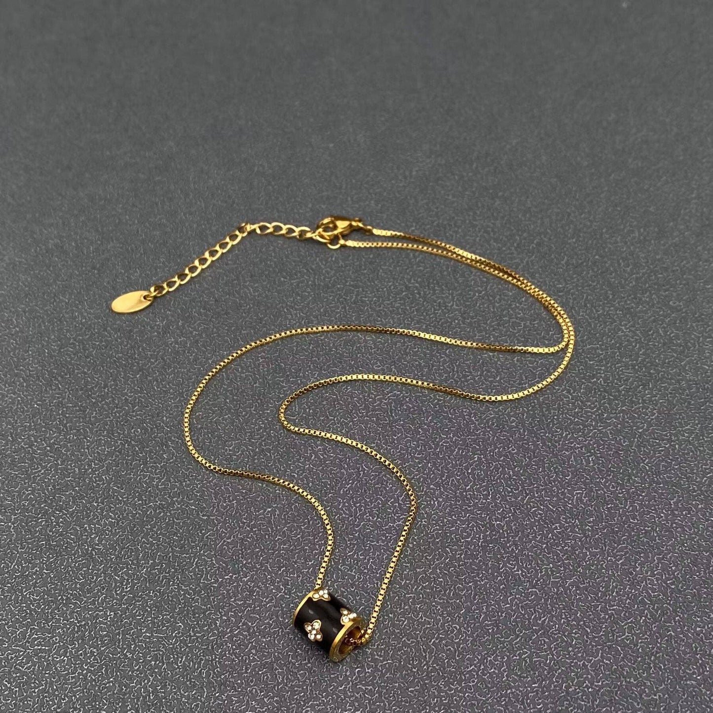 Inlaid CZ Black Roller Charm 18K Gold Plated SS Necklace - FGS